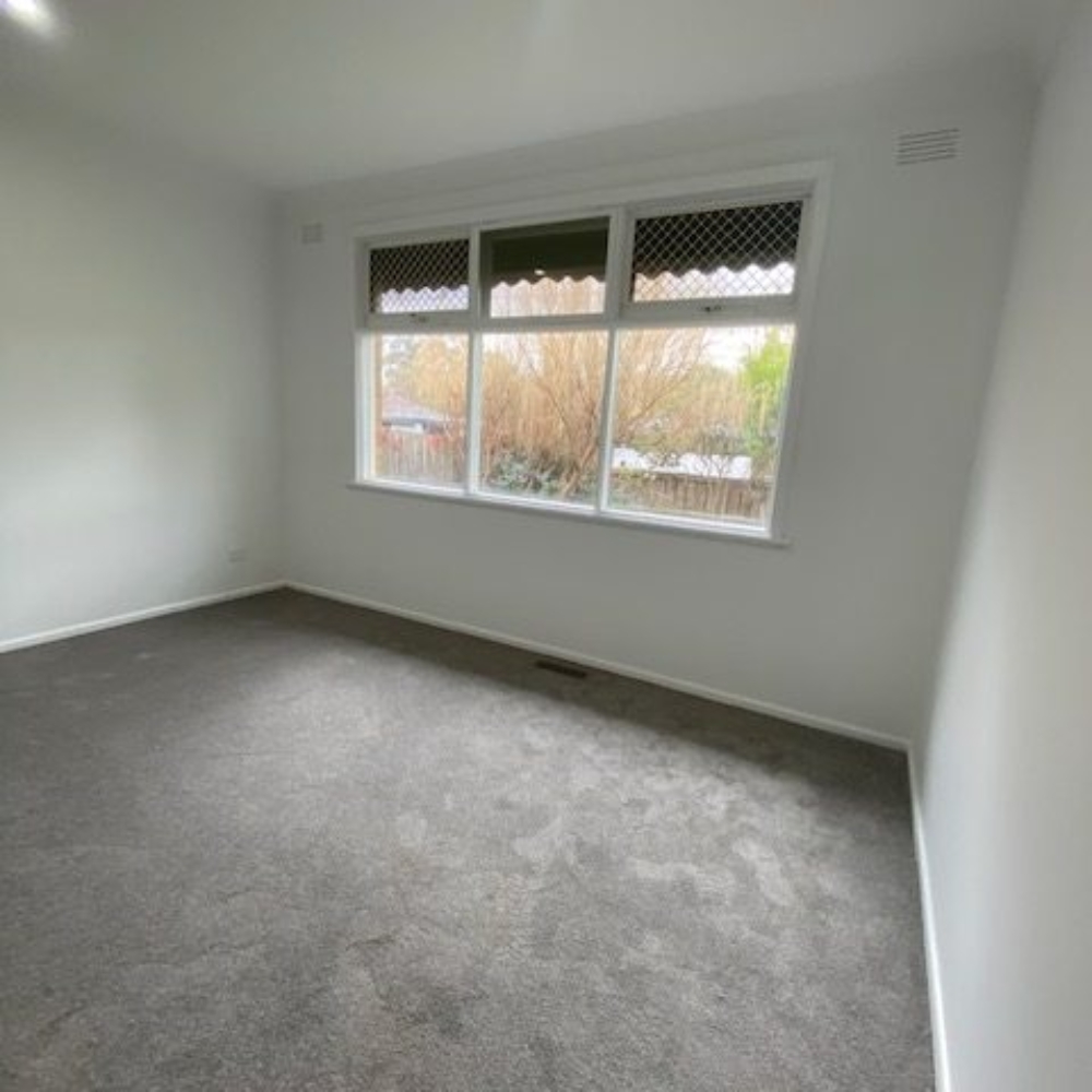 A room showcasing residential painting with clean walls